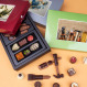 CHOCOLATE TOOL SET AND PRALINES.